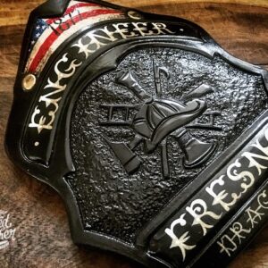 A hard-carved and hand-painted fire helmet shield by Smoked Leather.